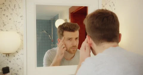 Man Selfcare Bathroom Mirror Checking Face Skin Health Morning Routine Vídeo Stock 195289809