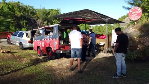 Man Selling Coffee in a Wagon Outside the Street Stock Footage 221418509