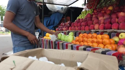Man selling fresh vegetables Stock Footage 284438164