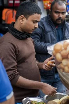 Man selling panipuri on streets Stock Photos