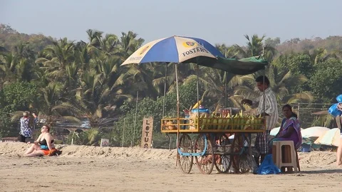 Man selling sweeet corn on Arambol beach. Stock Footage 124654606