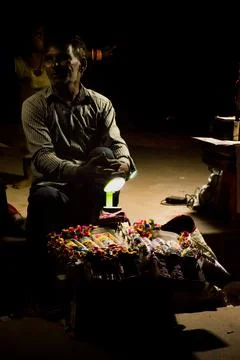 A man selling sweets. Stock Photos
