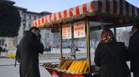 Man sells a corn and chestnuts Stockbeeldmateriaal 63044757