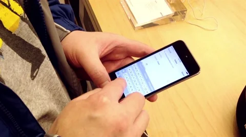Man sending video and typing text message to friend Stock Footage 48756430