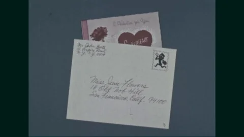 Man sends a letter with a zip code and the girl quickly receives it - 1960 Stock Footage 94255932