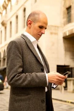 Man sends text Stock Photos