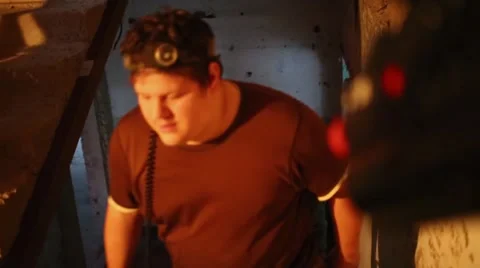 Man with sensor on head up stairs and two more on ground Stock Footage 63659594