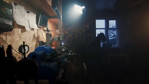 The man serves the CNC machine in the workshop Stock-Footage 84576221