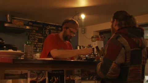 Man serving at a customer in a cafe / Tea house Stock Footage 112727099