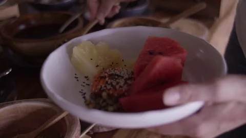 Man serving himself at buffet meal in hotel Stock Footage 74777774