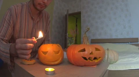 Man set fire pumpkin for Helloween Stock-Footage 68685362