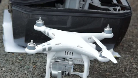 Man sets on drone propellers and tighten them. Stock Footage 69959747