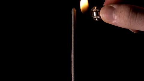 A man sets fire to pyrotechnics (sparkler). Slow motion. Stock Footage 117528784