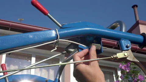 Man sets the light switch on the tractor Video stock 161464083