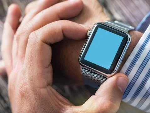 Man Setting Up Digital Watch App 스톡 사진