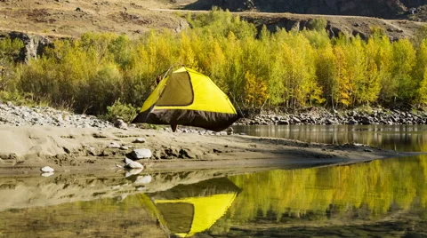 Man setting up his tent for camping Stock Footage 48894196