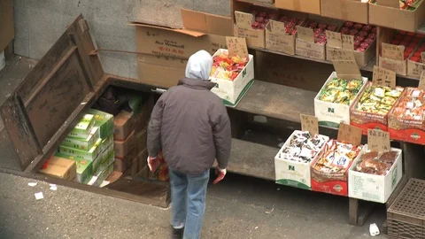 Man setting up stall in Chinatown Stock Footage 104879421