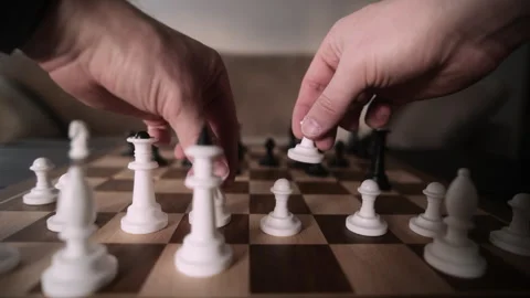 Man Setting White Chess Pieces On A Chessboard Stock Footage 341578306