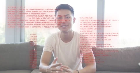 Man settling on gray sofa greeting camera initiating programming tutorial with Stockbeeldmateriaal 318550823