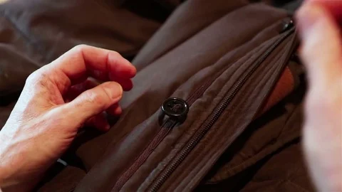 Man sewing a botton Stock Footage 80807382