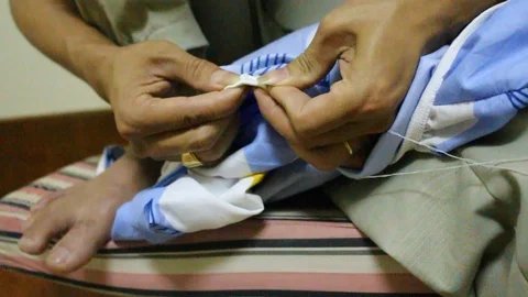 Man sewing clothes Stock Footage 91276910