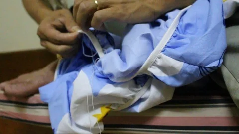 Man sewing clothes Stock Footage 91276930