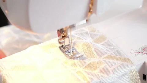 A man sews clothes on sewing machine. Hobbies, needlework, creativity. Stock Footage 192541483