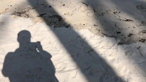 Man Shadow on The Sand Stock Footage 243945420