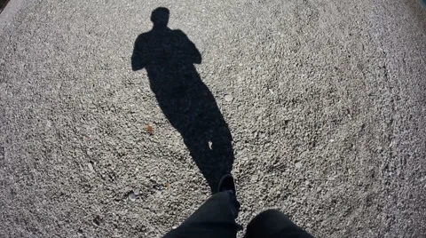 A man shadow walking on the sand beach 스톡 동영상 48802508