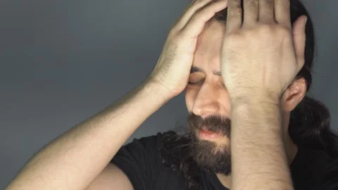 Man shakes his head tiredly Stock Footage 107375314