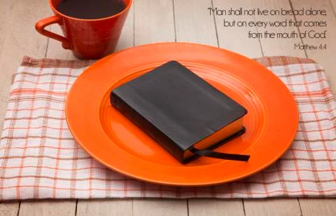 "Man shall not live on bread alone, but on every word that comes from the mou Stock Photos