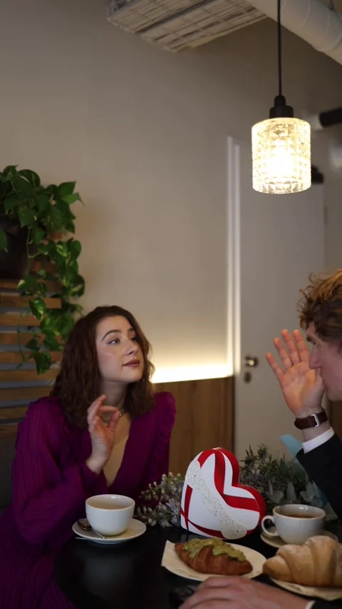 Man shares personal secrets while woman listens calmly Stock Footage 328301381