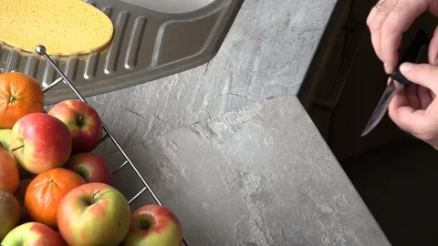 The man is sharpening a kitchen knife Stock Footage 95615537