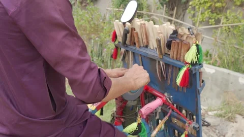 Man sharpening a knife Stock Footage 271622691