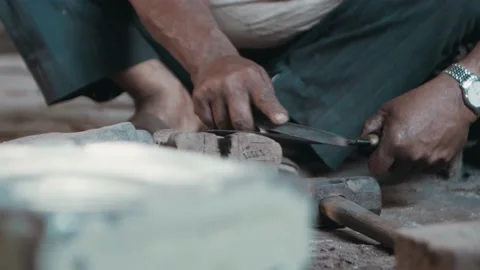 Man sharpening knife by hand using metal file Stock Footage 164192635