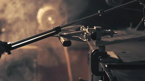 Man sharpening knife. Work on a sharpening machine Stock Footage 135074468