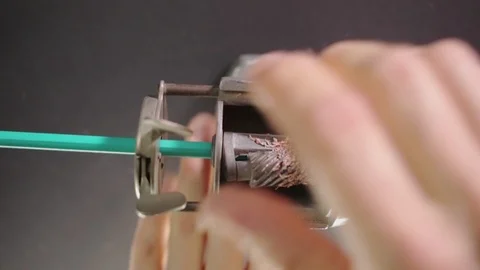 Man sharpening pencils. Video stock 102155512