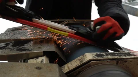Man sharpening skis for skiing. Professional machine prepare skis Stock Footage 87269339
