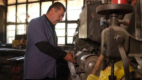 Man Sharpening Tool On Grinding Wheel With Sparks, August 20,2021, Akincilar Stock Footage 324567383