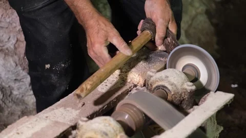 Man sharpens the ax in the workshop 2 Stock Footage 294066050