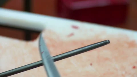 Man sharpens a knife in a factory Video stock 93134966