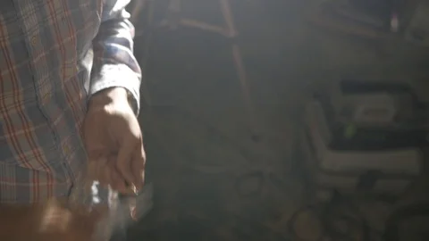 Man sharpens a pencil with a knife Stock Footage 99583038