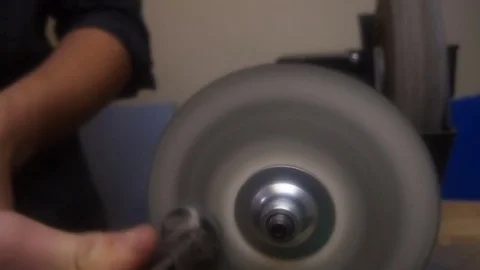 Man sharpens a working tool on a machine 스톡 동영상 81419376