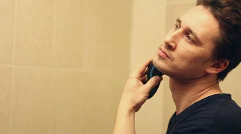 Man shave electric razor close up Stock Footage 60422810