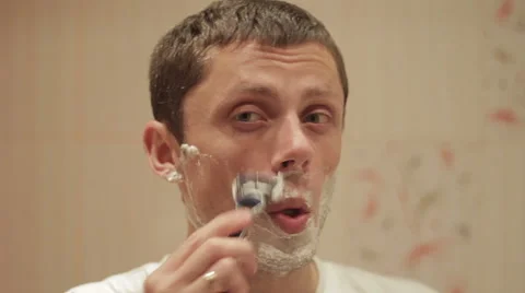 A man shaves Video stock 55759032