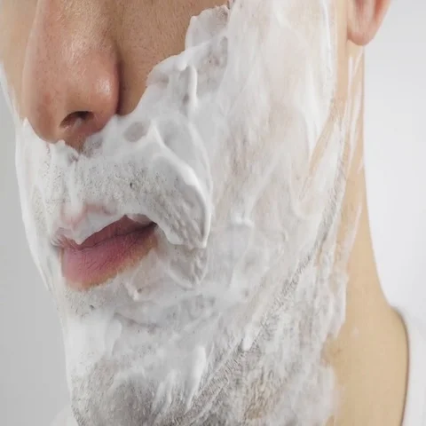 Man shaves his face. Stock Footage 69442199