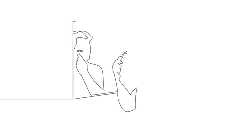 A man shaves his face in front of a mirror. Stock Footage 246311693