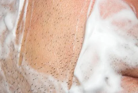 A man shaves the machine. Stock Photos