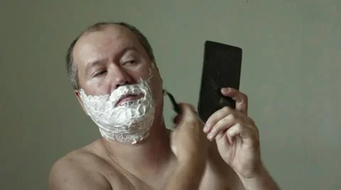 Man shaves timelapse Stock Footage 11987794