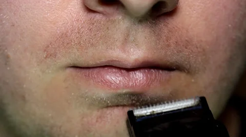 Man shaving with clippers Stock Footage 36645634